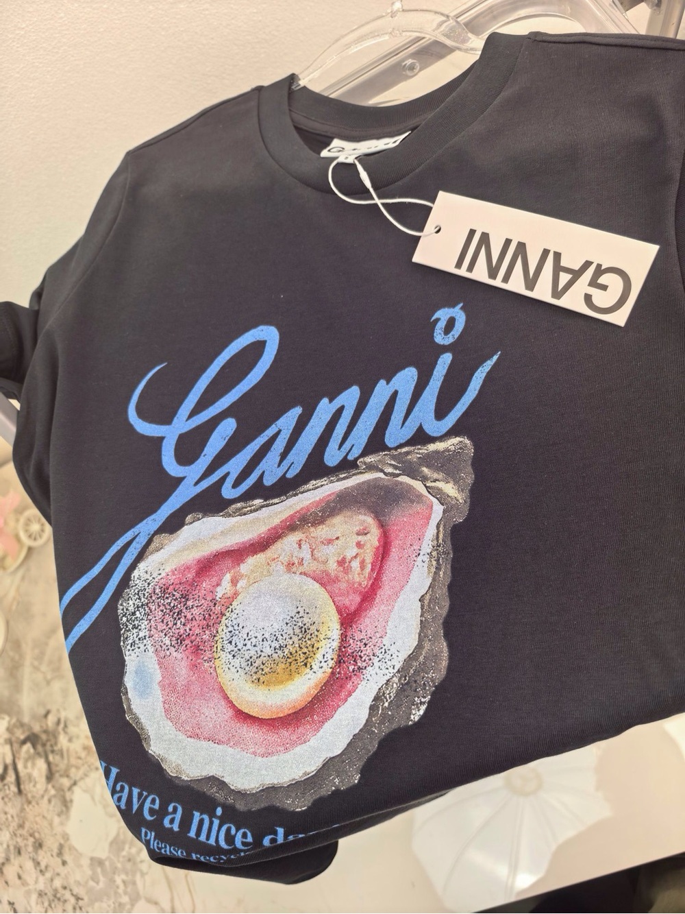 Ganni Black Tee with Blue Script and Multicolor Oyster Graphic - Picture 2 of 7